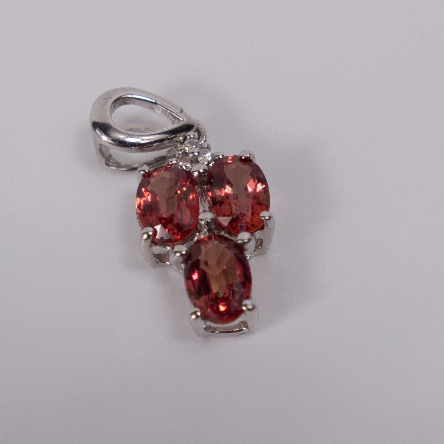 9ct White Gold Tourmaline Cluster Pendant with Diamond Accent