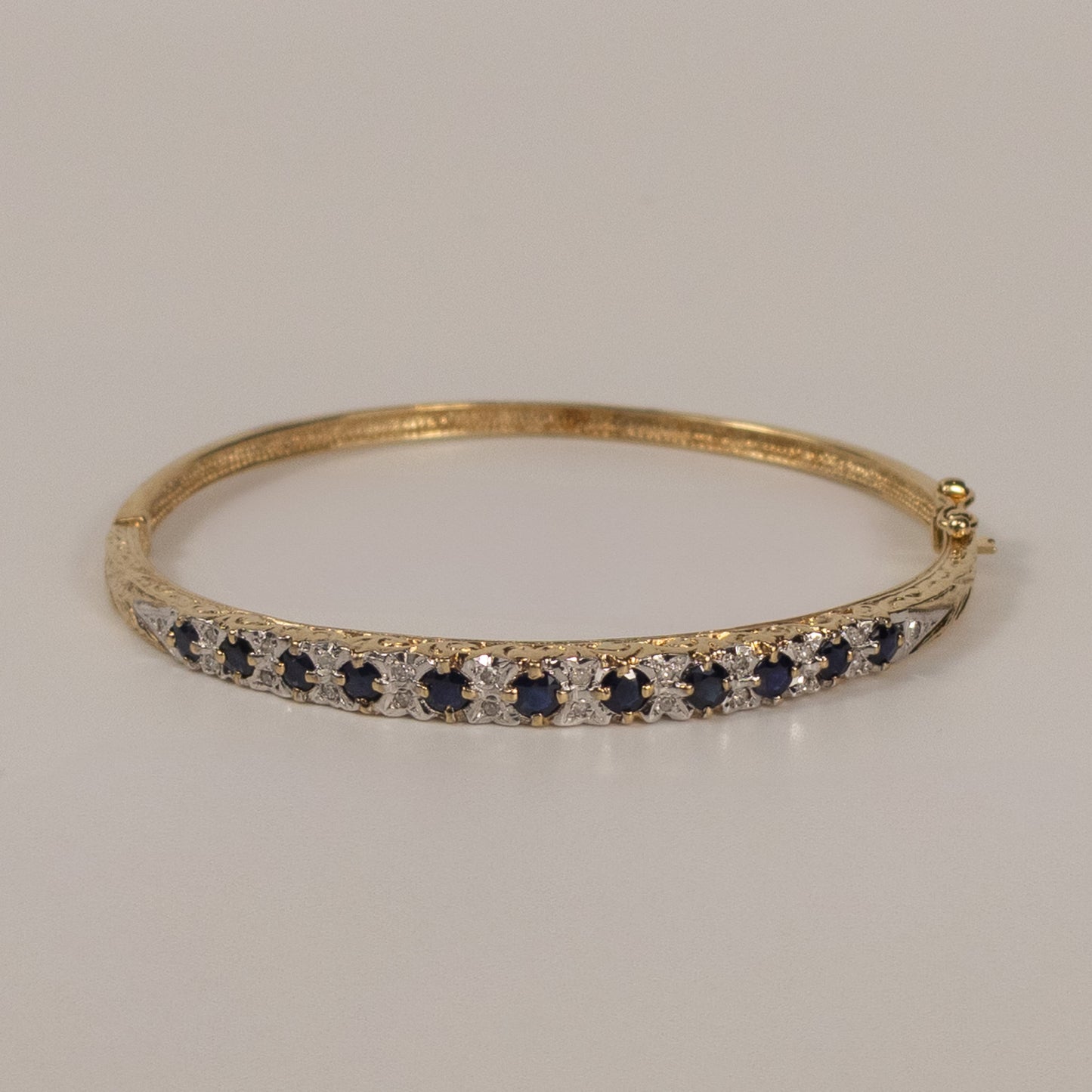 9ct Yellow Gold Sapphire and Diamond Set Hinged Bangle
