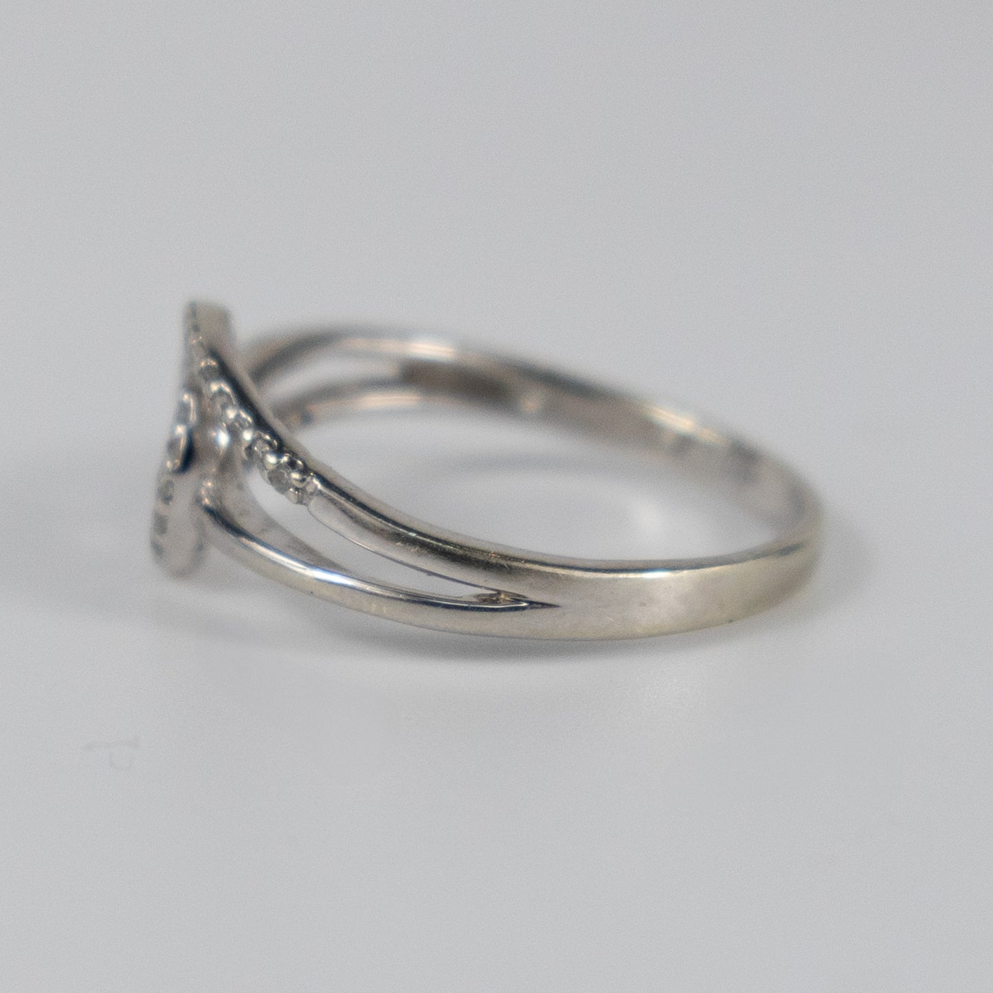 9ct White Gold Twist Ring with Diamond Accents