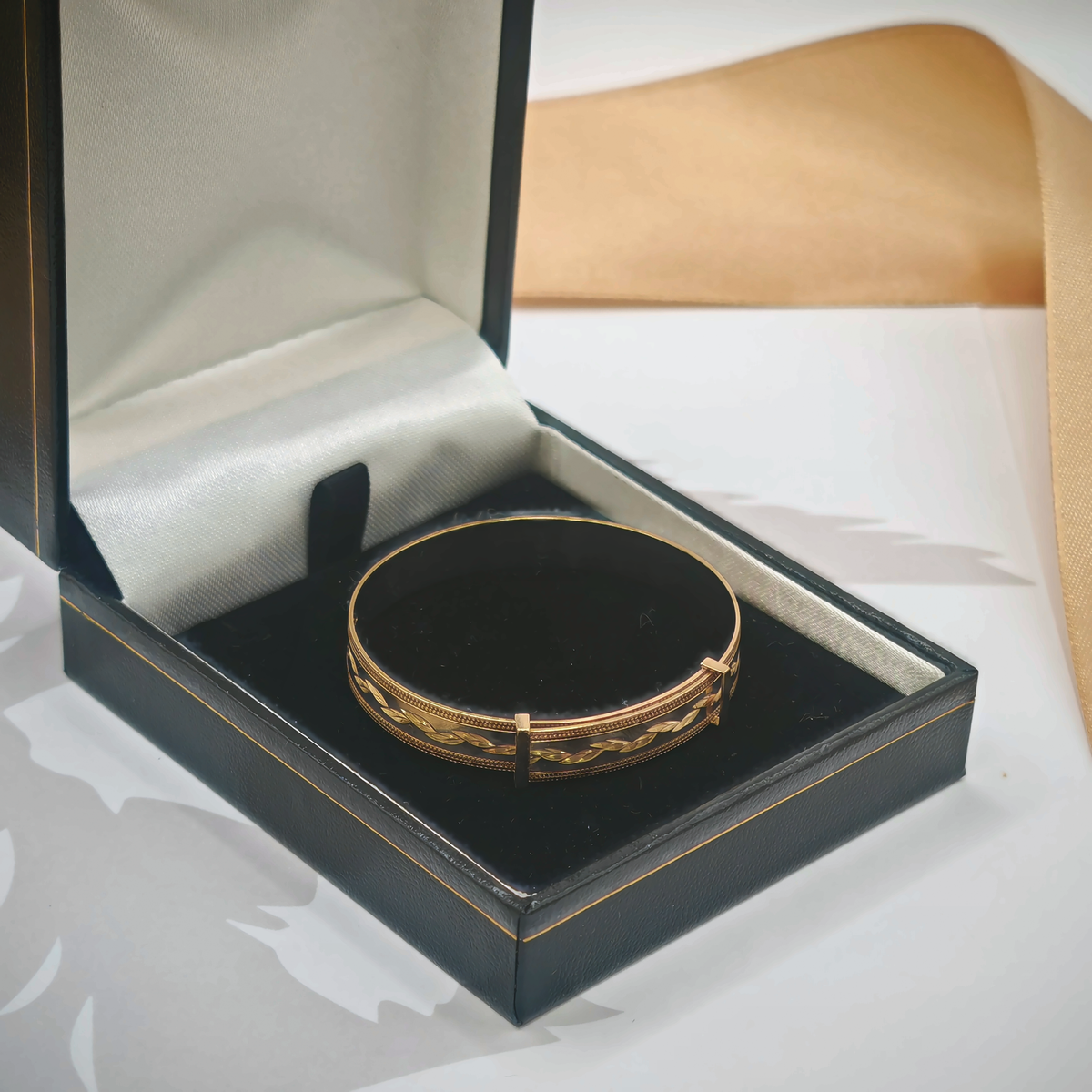 9ct Yellow Gold Engraved Leaf Design Hinged Bangle, photograph 2 of 7. SKU JB3628.