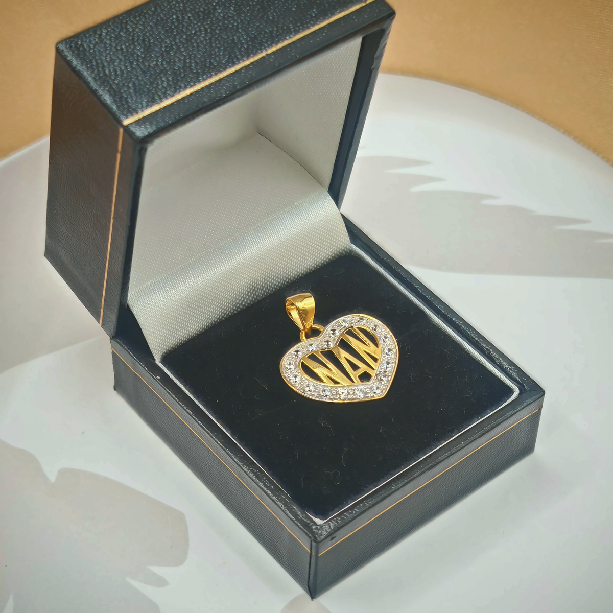 Sterling Silver CZ Nan Heart Pendant, photograph 2 of 6. SKU SIL-35.