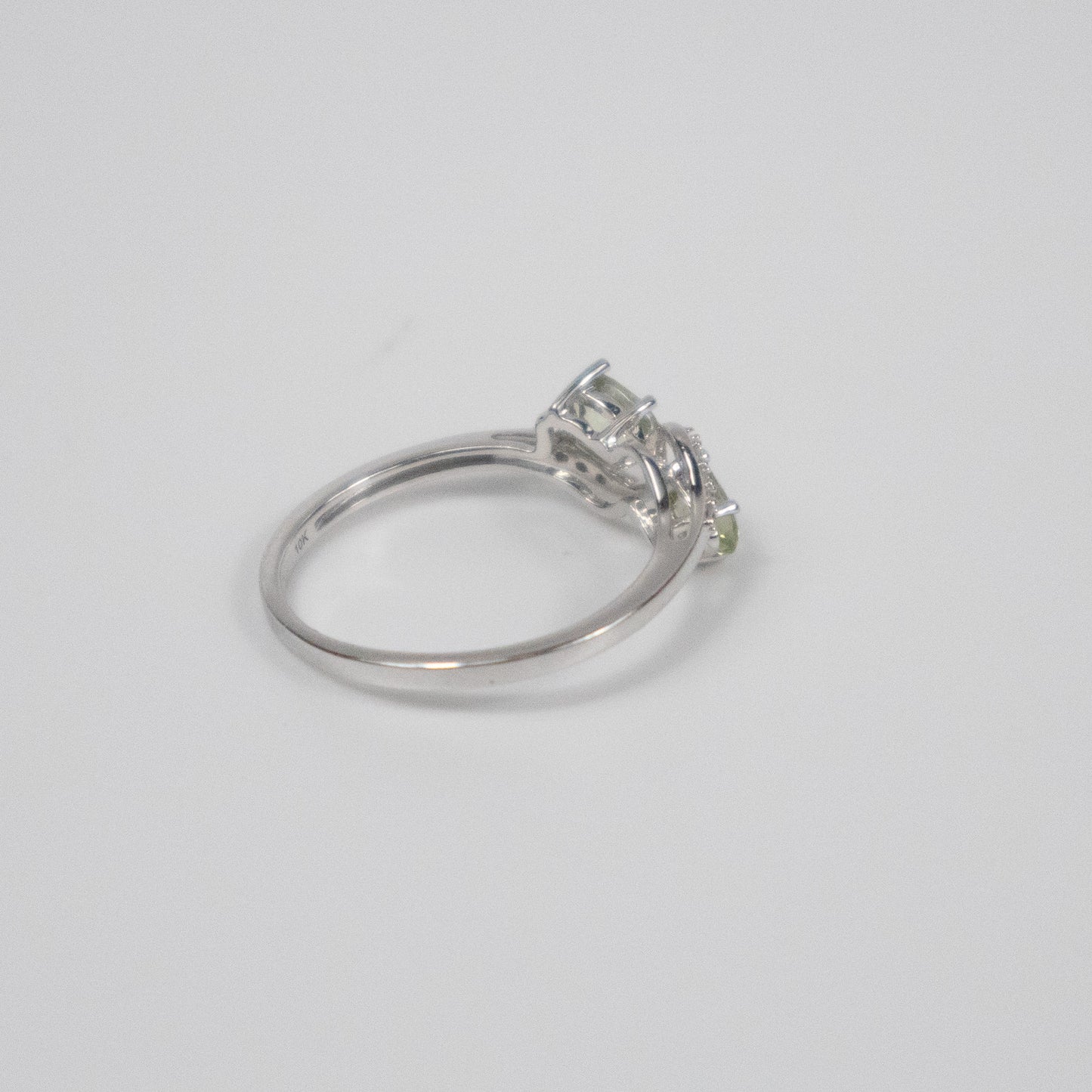 Second-Hand 9ct White Gold Peridot and Diamond Bypass Ring