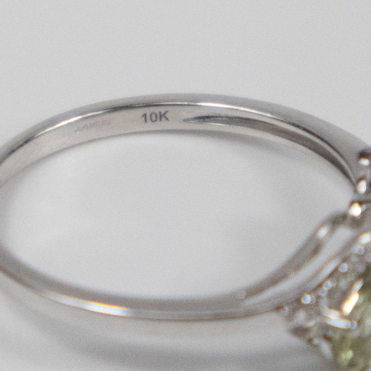 Second-Hand 9ct White Gold Peridot and Diamond Bypass Ring