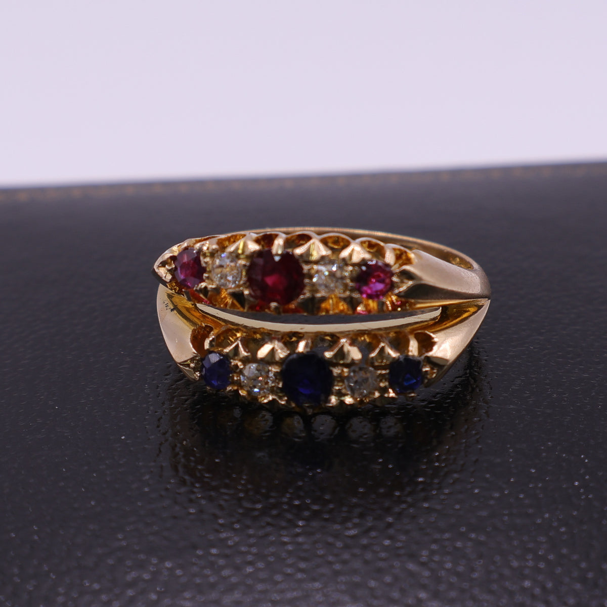 18ct Yellow Gold Ruby, Sapphire and Diamond Crossover Ring