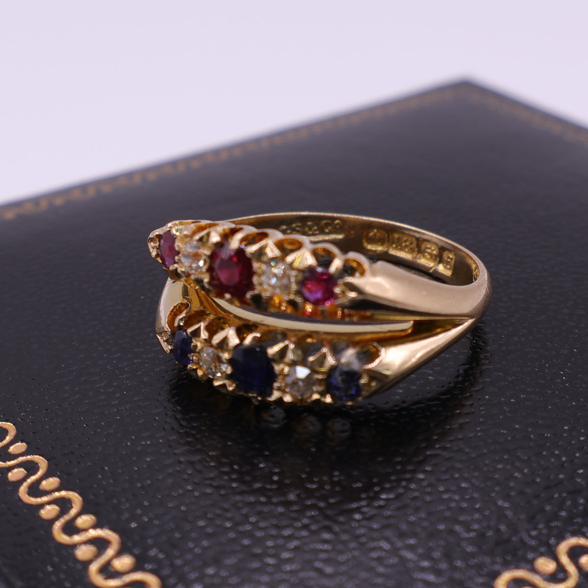 18ct Yellow Gold Ruby, Sapphire and Diamond Crossover Ring