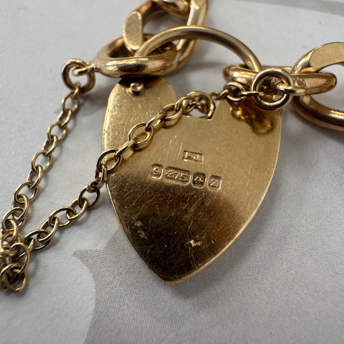 9ct Gold Curb Link Heart Padlock Charm Bracelet