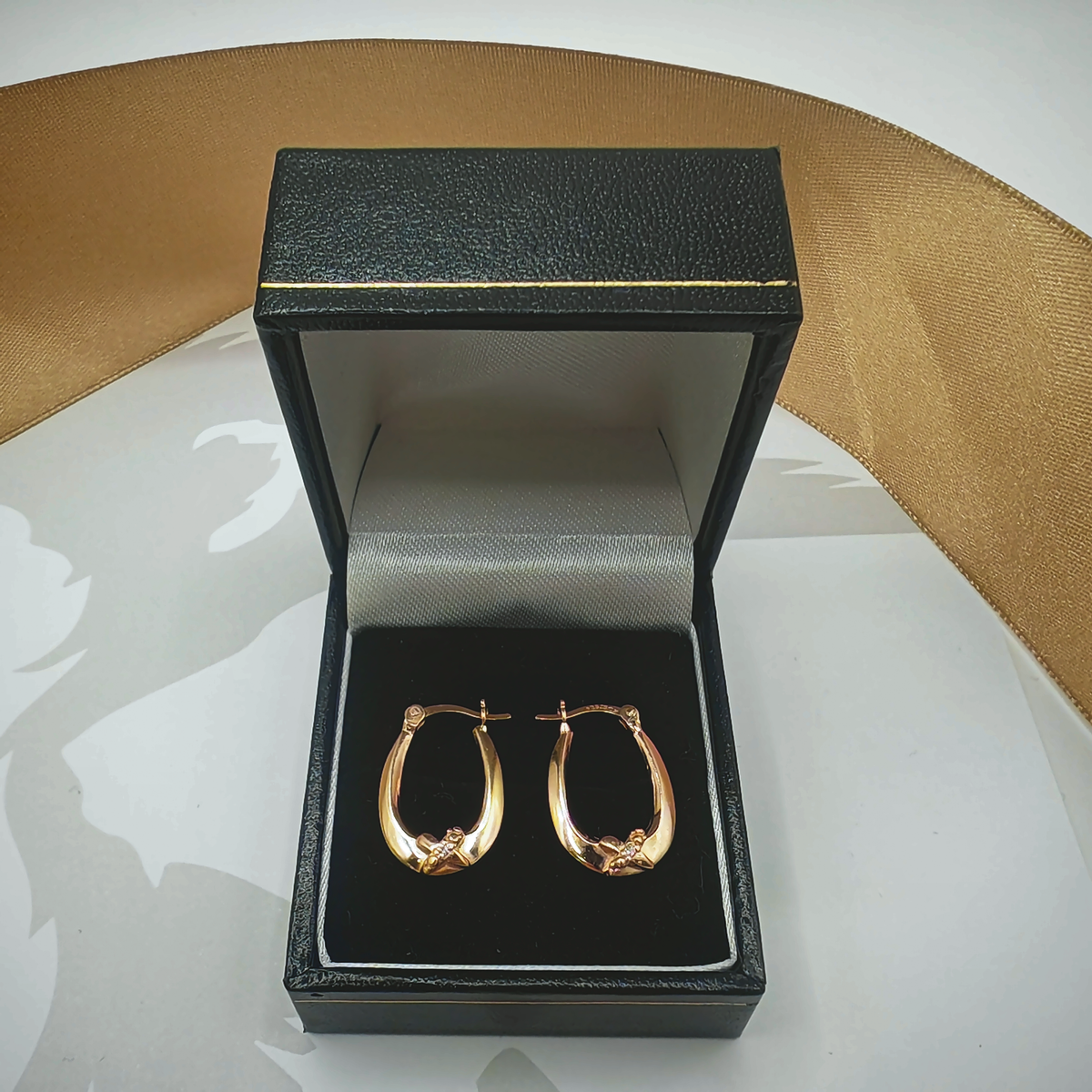 Yellow Gold Tone CZ Bow Detail Oval Creole Hoop Earrings