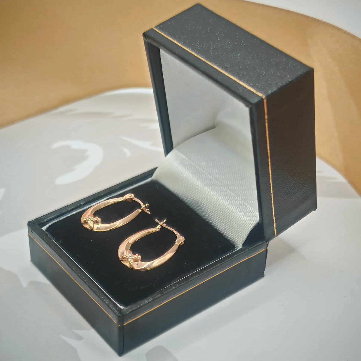 Yellow Gold Tone CZ Bow Detail Oval Creole Hoop Earrings – view 3