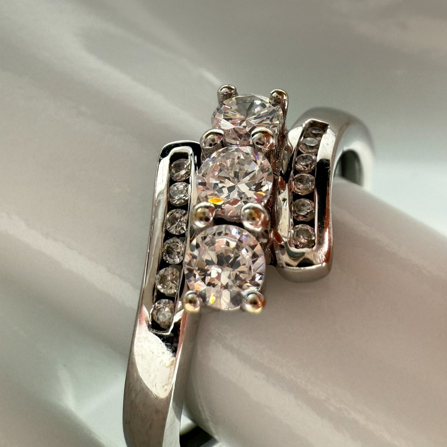 9ct White Gold Cubic Zirconia Three-Stone Ring with Channel Set Shoulders