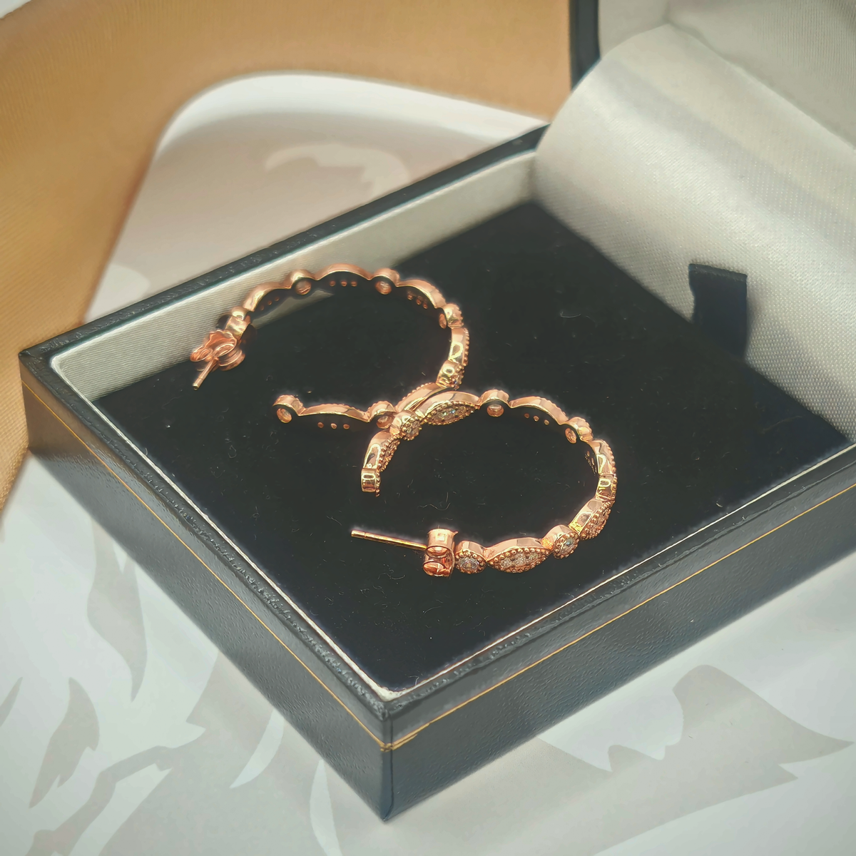 Sterling Silver Rose Gold Tone CZ Hoop Earrings, photograph 3 of 6. SKU SIL-23.