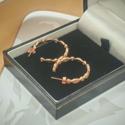 Sterling Silver Rose Gold Tone CZ Hoop Earrings, photograph 3 of 6. SKU SIL-23.