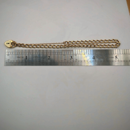 9ct Yellow Gold Curb Link Bracelet with Heart Padlock Clasp, photograph 8 of 8. SKU JB3627.