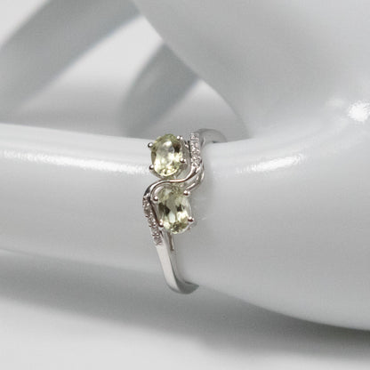Second-Hand 9ct White Gold Peridot and Diamond Bypass Ring