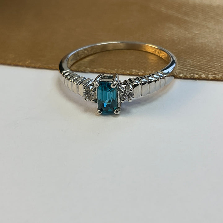 9ct White Gold Blue Topaz and Diamond Dress Ring