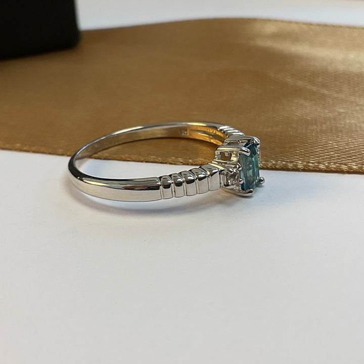 9ct White Gold Blue Topaz and Diamond Dress Ring