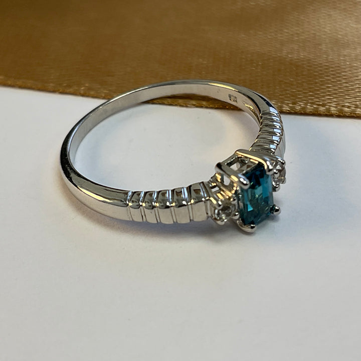 9ct White Gold Blue Topaz and Diamond Dress Ring