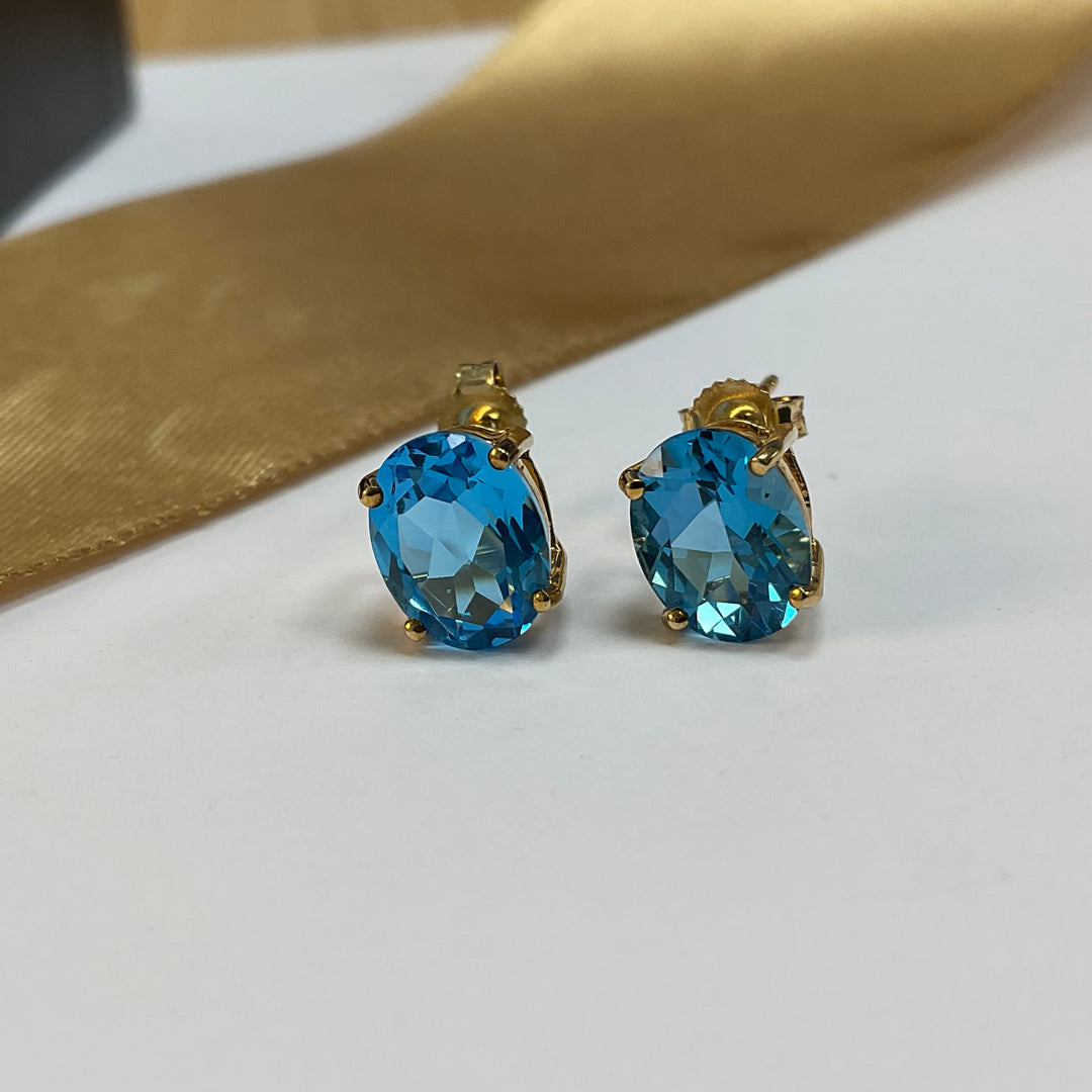 9ct Yellow Gold Blue Topaz Oval Stud Earrings