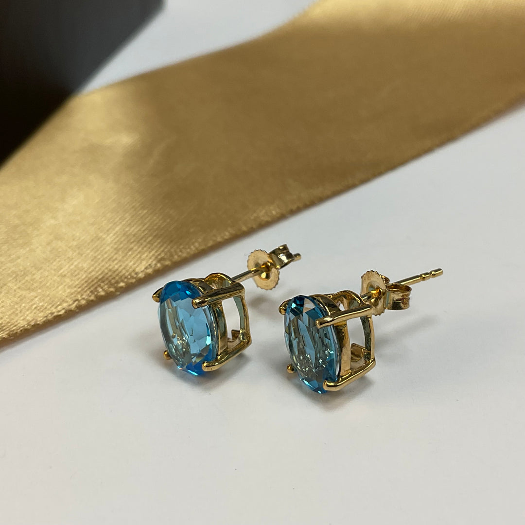 9ct Yellow Gold Blue Topaz Oval Stud Earrings