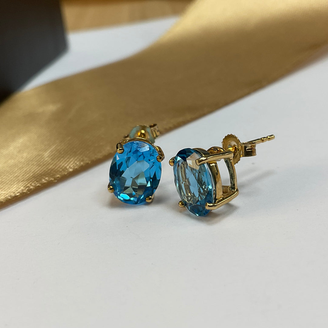 9ct Yellow Gold Blue Topaz Oval Stud Earrings