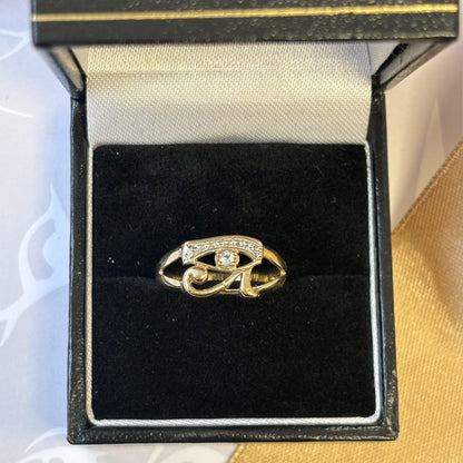 9ct Gold Eye design Aquamarine Diamond Ring