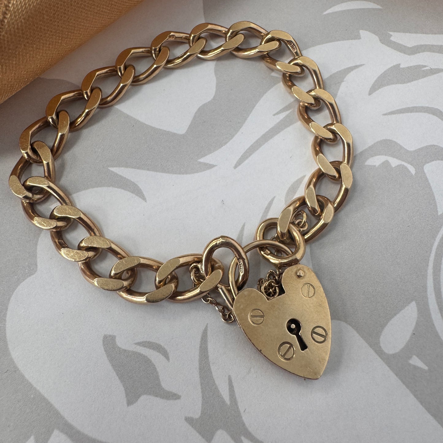 9ct Gold Curb Link Heart Padlock Charm Bracelet